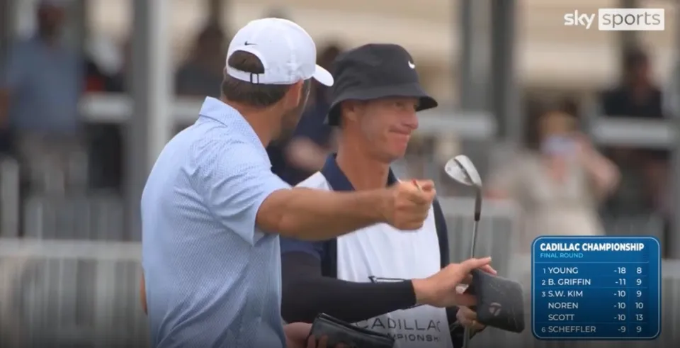 Scheffler's caddie Ted Scott got an ear full 