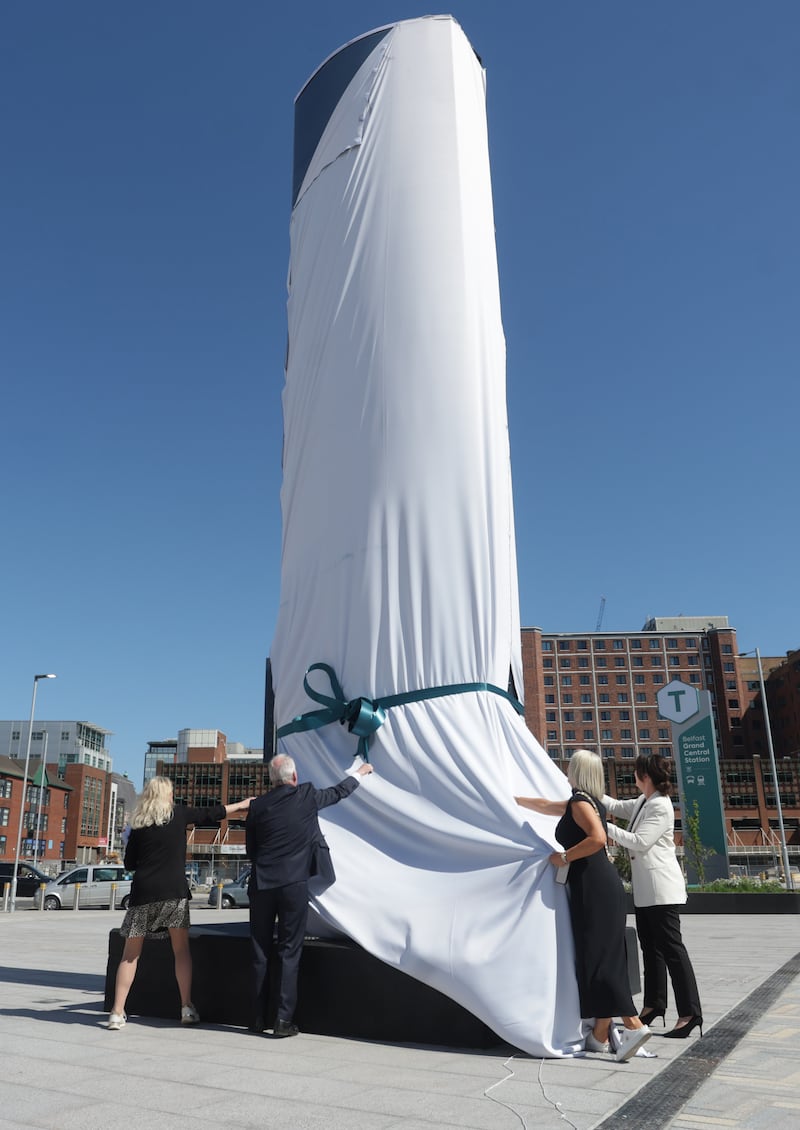 The unveiling of a new Sculpture, Titled Reflections.The  nine-metre-high sculpture forms the centrepiece of Saltwater Square at Weavers Cross and has been designed by Golden Thread Gallery, inspired by Translink's extensive engagement with local communities. The artwork was expertly fabricated by Northern Ireland artist Kevin Killen.
PICTURE: COLM LENAGHAN