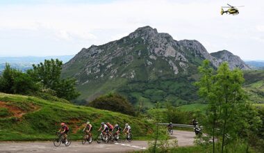 riders in La Vuelta Femenina climb a mountain