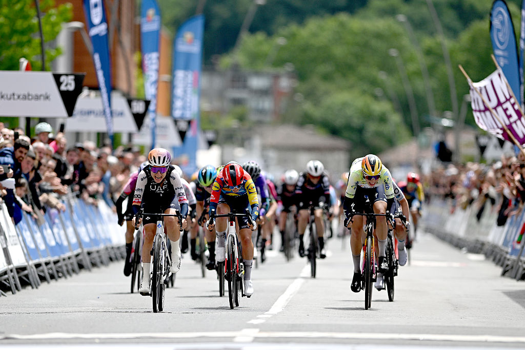 AMOREBIETA-ETXANO, SPAIN - MAY 16: (L-R) Stage winner Dominika Wlodarczyk of Poland and UAE Team ADQ, Shirin van Anrooij of Netherlands and Team Lidl - Trek and Mischa Bredewold of Netherlands and Team SD Worx - Protime - Yellow Leader Jersey during the 5th Itzulia Women 2026, Stage 2 a 138km stage from Abadino to Amorebieta-Etxano / #UCIWWT / on May 16, 2026 in Amorebieta-Etxano, Spain. (Photo by Szymon Gruchalski/Getty Images)
