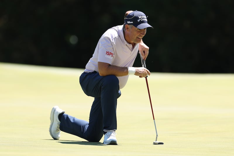 Pádraig Harrington of Ireland looks over a putt on the 12th hole. Photograph: Andrew Redington/Getty