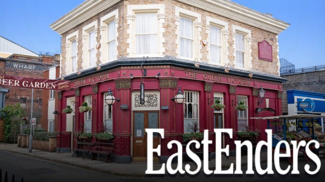 The exterior of the Queen Vic pub in EastEnders, with the soap logo in the corner.
