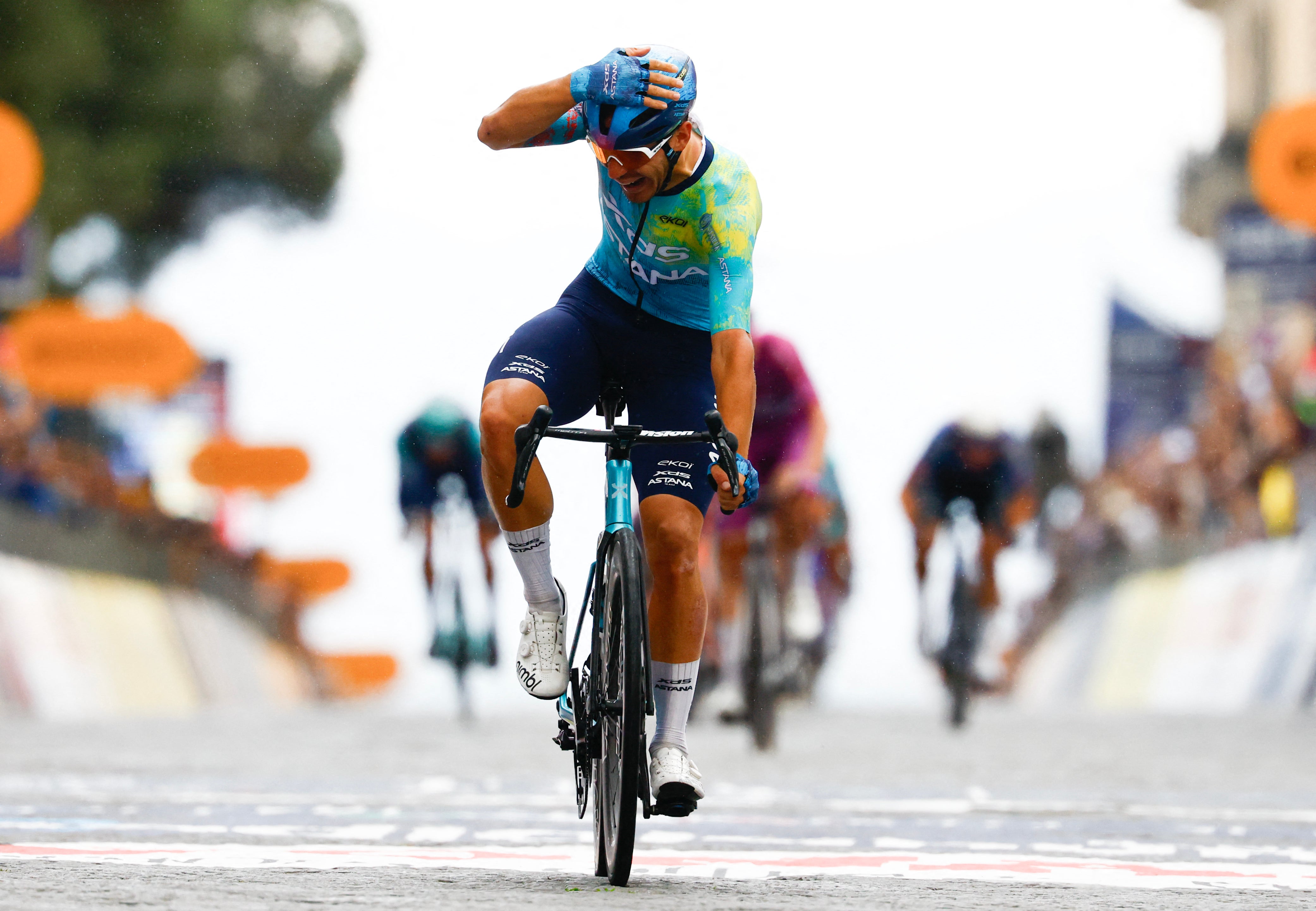 Davide Ballerini won a rain- and crash-affected stage six in Naples