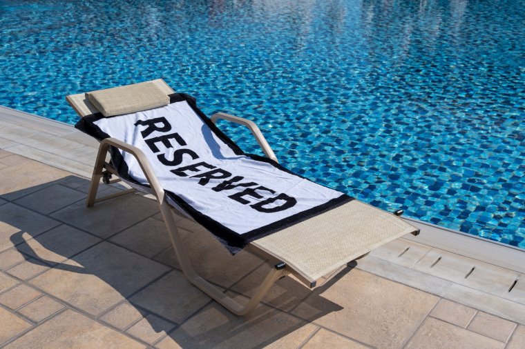The practice of 'reserving' poolside sunloungers is highly contentious (Photo: clubfoto/Getty Images)