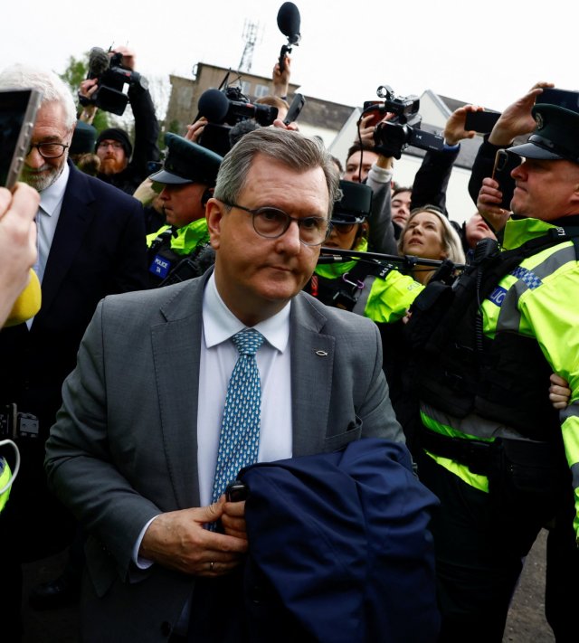 Jeffrey Donaldson, former leader of the Democratic Unionist Party (DUP) charged with historical sex offences, walks outside the Newry Magistrates Court, in Newry, Northern Ireland, April 24, 2024. REUTERS/Clodagh Kilcoyne