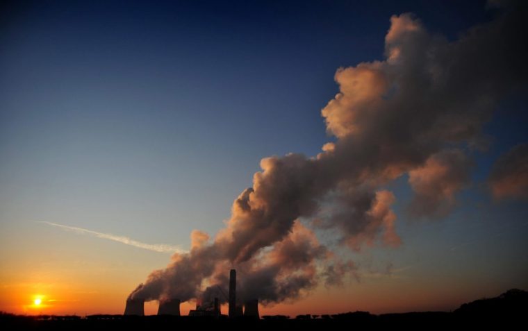 File photo dated 17/01/12 of the sun setting over Ratcliffe on Soar Power Station near Nottingham. Carbon emissions from fossil fuels are set to reach a new high in 2024, with no clear signs yet of the urgently-needed peak in pollution to curb global warming, scientists have said. Issue date: Wednesday November 13, 2024. PA Photo. Global emissions of carbon dioxide, the main greenhouse gas driving climate change, need to peak and fall rapidly to zero overall if the world is to have a chance of limiting rising temperatures to levels that avoid the worst impacts of warming. See PA story ENVIRONMENT ClimateCarbon. Photo credit should read: Matthew Vincent/PA Wire
