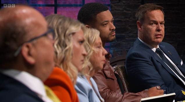 Peter Jones looking at fellow Dragons' Den stars Steven Bartlett, Deborah Meaden, Sara Davies and Touker Suleyman