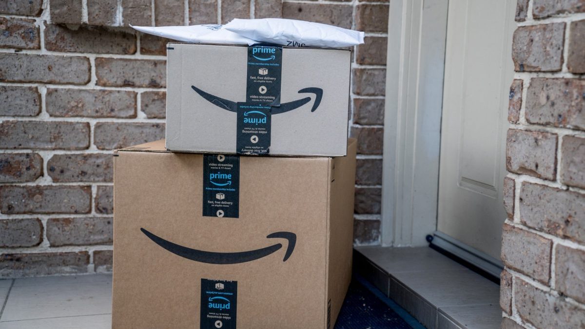 Sydney, Australia - 2022-07-22 Amazon prime boxes and envelopes delivered to a front door of residential building. Black Friday Cyber Monday Christmas Sale Prime Day. Amazon Flex delivery