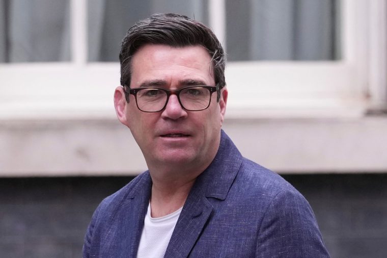 Mayor of Greater Manchester Andy Burnham arrives for a meeting in 10 Downing Street, London, Tuesday, March 31, 2026. (AP Photo/Alastair Grant)