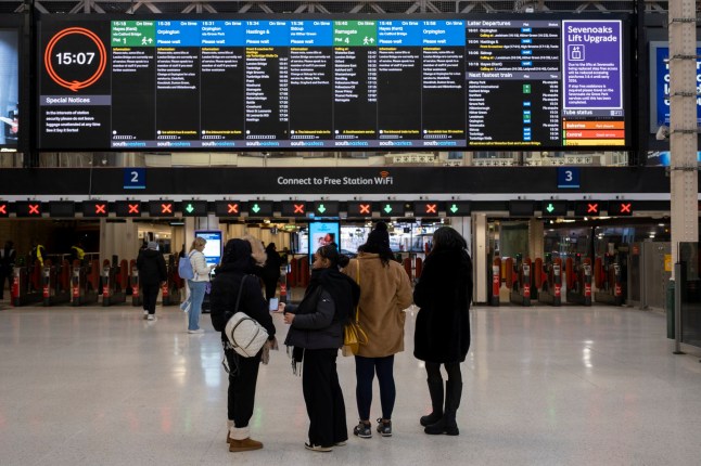 People standing on the main concourse at Charing Cross Railway Station looking at the new timetables on 30th November 2025 in London, United Kingdom. (Picture: In Pictures/Getty Images)