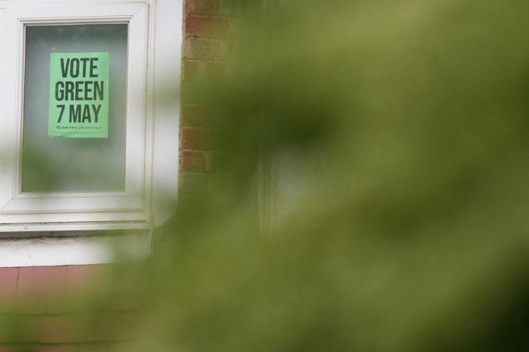 A Green Party political sign put up by the householder to show support ahead of local council elections in London, Wednesday, May 6, 2026. (AP Photo/Alastair Grant)
