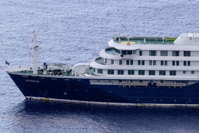 SAINT HELENA ISLAND - APRIL 24: A view of the Dutch-flagged vessel MV Hondius is seen navigating the Atlantic Ocean near Saint Helena Island on April 24, 2026. World Health Organization (WHO) Director-General Tedros Adhanom Ghebreyesus reported that seven cases of hantavirus, three of which were fatal, were detected on the MV Hondius, which was traveling from Argentina in the South Atlantic to Cabo Verde off the west coast of Africa. (Photo by Emin Yogurtcuoglu/Anadolu via Getty Images)