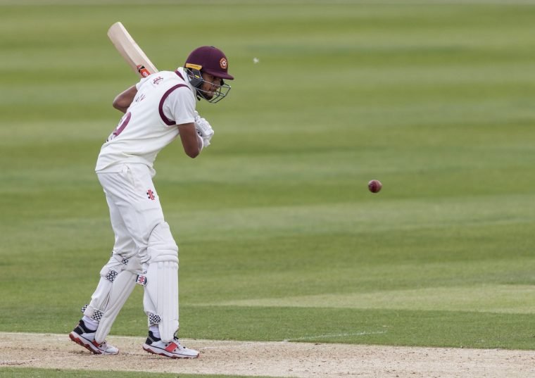 NORTHAMPTON, ENGLAND - JULY 28: Emilio Gay of Northamptonshire keeps a close eye on the ball during day one of the pre-season friendly match between Northamptonshire and Middlesex at The County Ground on July 28, 2020 in Northampton, England. (Photo by Andy Kearns/Getty Images)