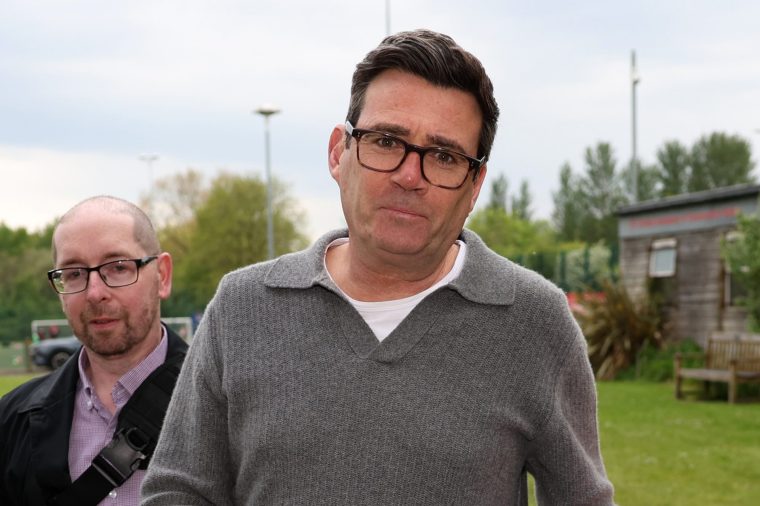 MOSTON, ENGLAND - MAY 8: Mayor of Greater Manchester, Andy Burnham arrives at FC United for a charity football match at Broadhurst Park on May 8, 2026 in Moston, England. Andy Burnham is seen by some in the Labour Party as a possible successor to leader Keir Starmer. (Photo by Ryan Jenkinson/Getty Images)