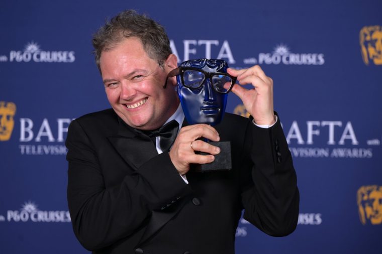 LONDON, ENGLAND - MAY 10: Alan Carr with the P&O Cruises Memorable Moment Award for The Celebrity Traitors during the 2026 BAFTA Television Awards with P&O Cruises at The Royal Festival Hall on May 10, 2026 in London, England. (Photo by Stuart Wilson/BAFTA/Getty Images for BAFTA)