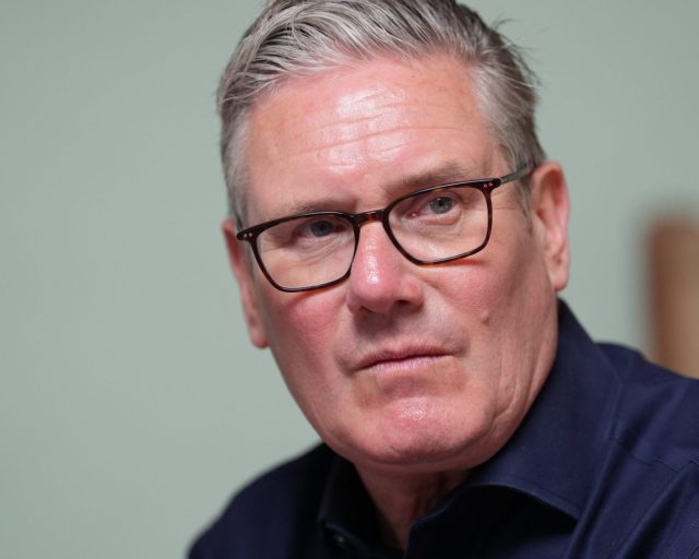 Britain's Prime Minister Sir Keir Starmer looks on during a visit to a nursery in Brighton, south coast of England, on May 26, 2026, to announce a range of measures to support parents and families with childcare costs. (Photo by Gareth Fuller / POOL / AFP via Getty Images)