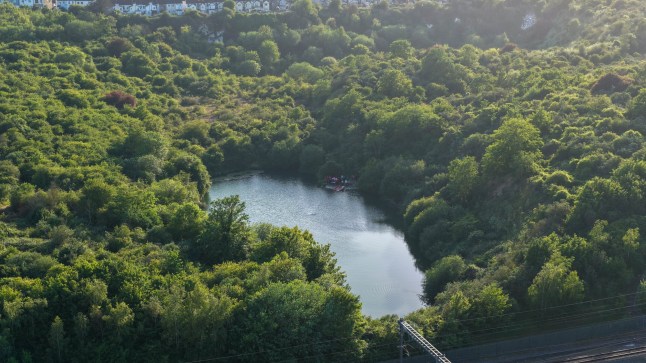 A major emergency services operation is underway in Kent after a well-known local boxer was reported missing after entering the water near Northfleet. Kent Police were called at around 2.51pm on Wednesday 27 May 2026 following concerns for a person in the Galley Hill Road area of Swanscombe. Officers remain at the scene alongside multiple emergency service agencies as an extensive search operation continues. The response has involved: Kent Police specialist water rescue teams thermal drone operators volunteers from Kent Search and Rescue The HART team from South East Coast Ambulance Service Police cordons have been put in place around the area while emergency crews continue searching the water and the surrounding shoreline. Family members of the missing man have reportedly been advised to remain at home while officers continue enquiries and rescue efforts. Community Concern Grows Local residents described seeing a significant emergency services presence throughout the afternoon and evening, including rescue boats, emergency vehicles and drone teams operating over the water. A man at the scene, who asked not to be named, said the missing person was believed to be a member of the local boxing gym and was very known within the local community. He added: ???I just wish young people would listen to the warnings about the dangers of going into the water.??? The incident has sparked widespread concern locally as emergency services continue their search efforts. Ongoing Emergency Operation At this stage, police have not released further details regarding the circumstances surrounding the incident. Search operations remain ongoing, and members of the public are being urged to avoid the area while emergency crews work at the scene. Further updates are expected from Kent Police as the incident develops.