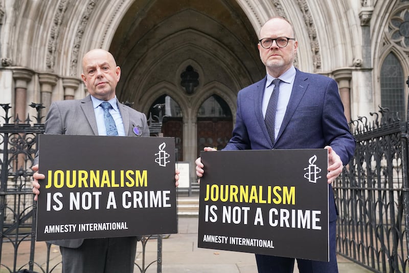 Journalists Barry McCaffrey (left) and Trevor Birney outside the Royal Courts of Justice, in London, last year