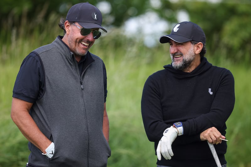 Phil Mickelson with Yasir Al-Rumayyan, then chairman of LIV Golf, during the Pro-Am before last June's LIV Golf Invitational at The Centurion Club in St Albans, England. Photograph: Charlie Crowhurst/LIV Golf/Getty Images