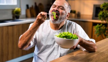 Senior Indian Man Eating Green Salad