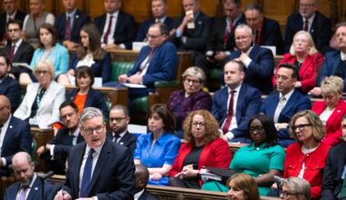 Keir Starmer addressing backbench MPs in a parliamentary setting, highlighting political strategy and leadership discussions.