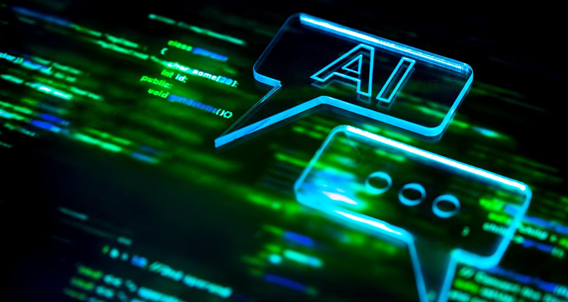 A rendered image showing an AI speech bubble icon over blurred programming code background, symbolizing chatbot communication, machine learning, cloud data exchange and futuristic digital interaction