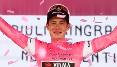 Team Visma Lease a Bike Danish rider Jonas Vingegaard celebrates on the podium with the overall leader's pink jersey after the 20th stage of the Giro d'Italia 2026 - Tour of Italy cycling race between Gemona del Friuli and Piancavallo, Italy, on May 30, 2026. (Photo by Luca Bettini / AFP)