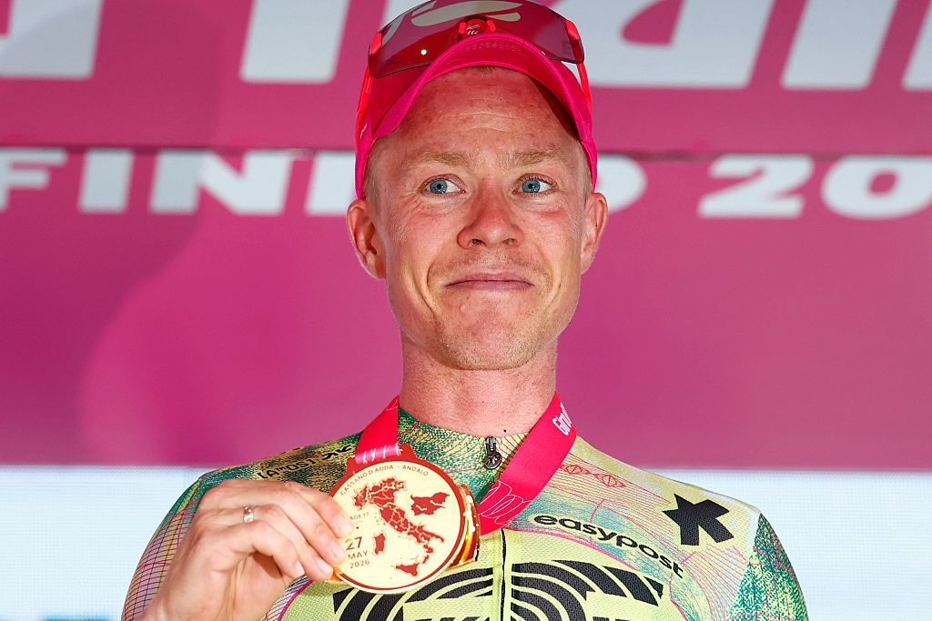 Valgren holds the medal for stage winner on the podium