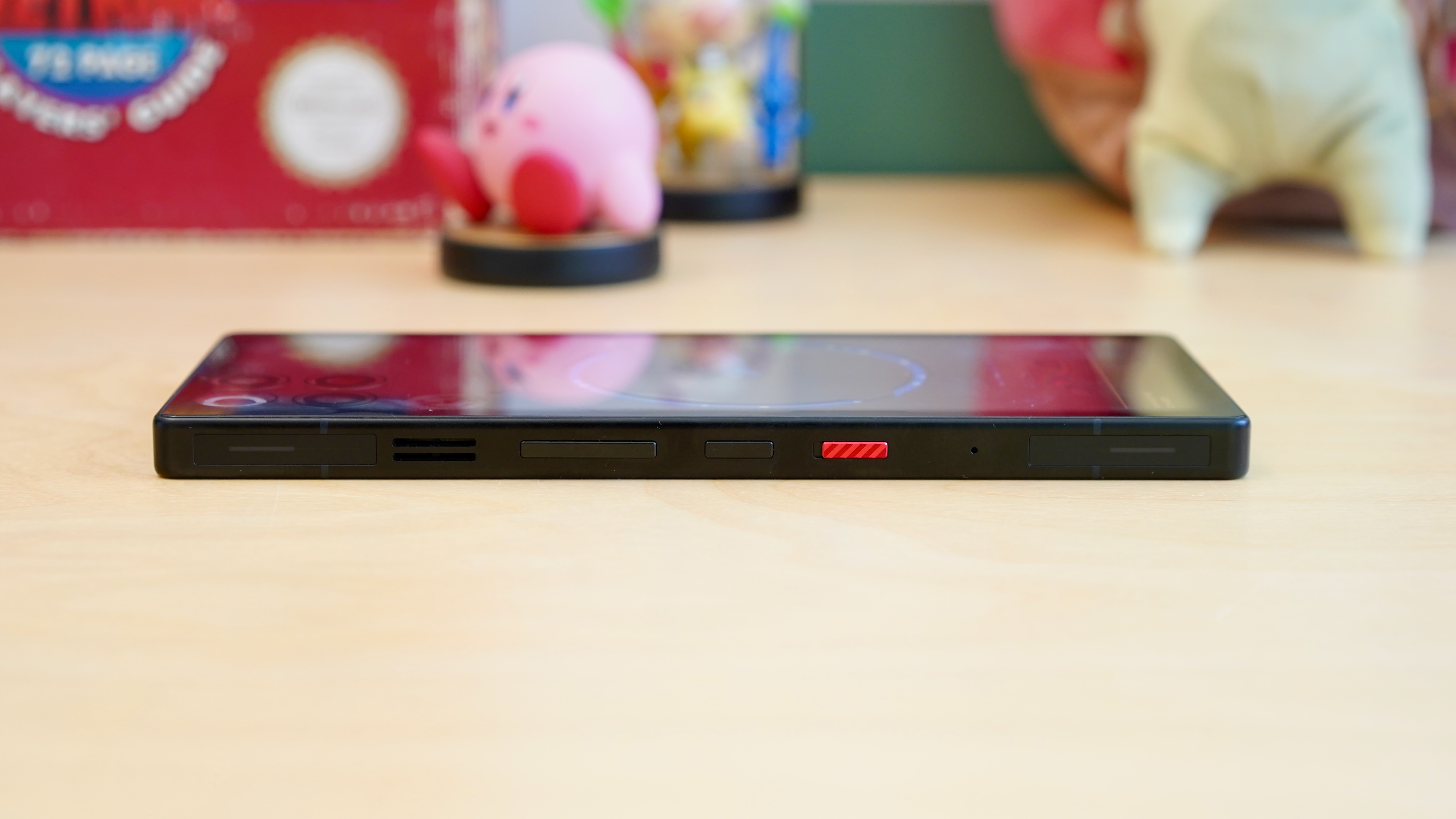 The RedMagic 11S Pro resting on a wooden table