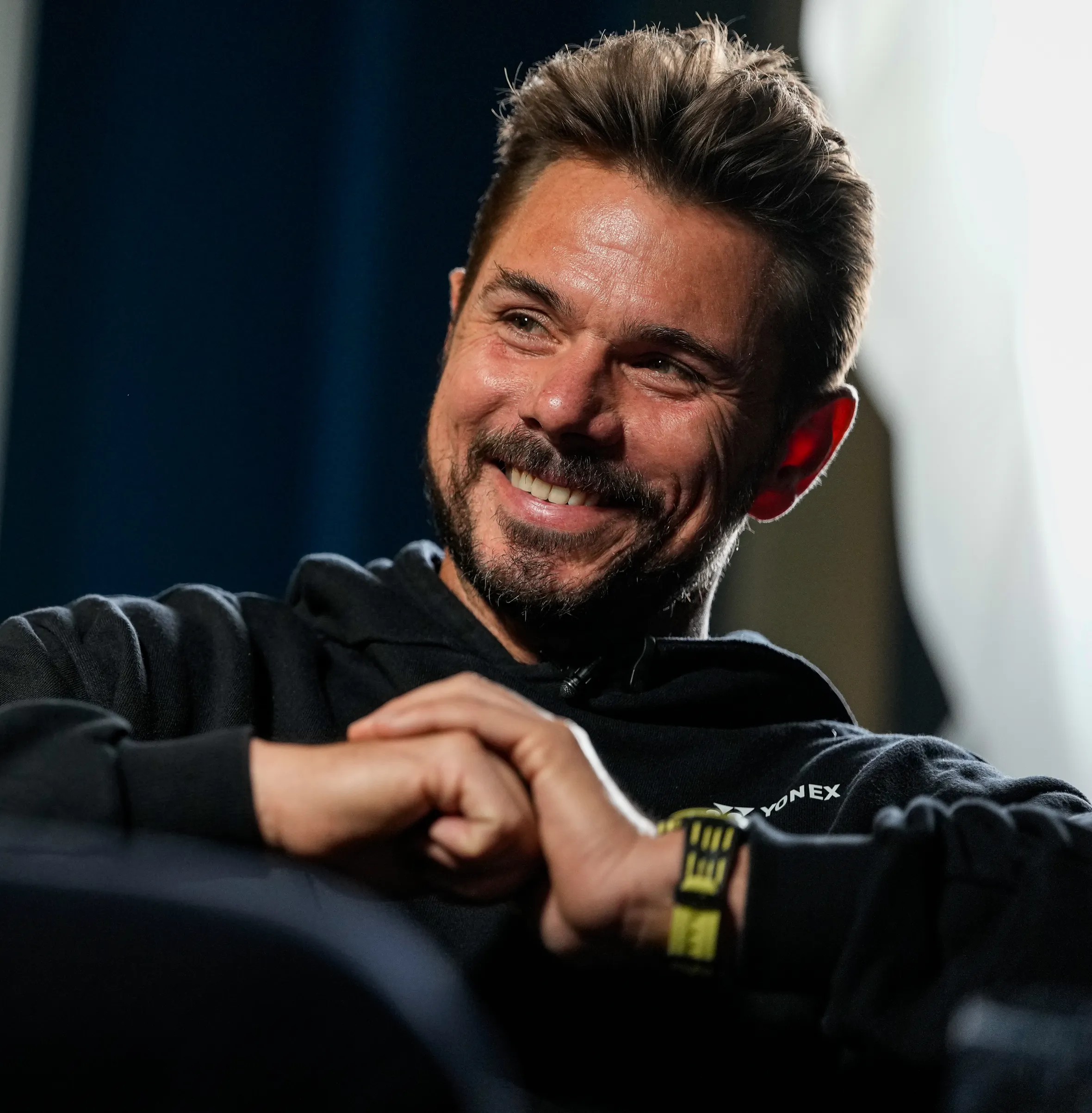 Stan Wawrinka smiling during an interview.