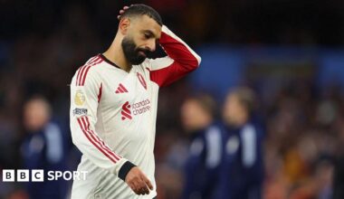 Referee Michael Salisbury signals before he awards a second goal to Matheus Cunha of Manchester United after a VAR check
