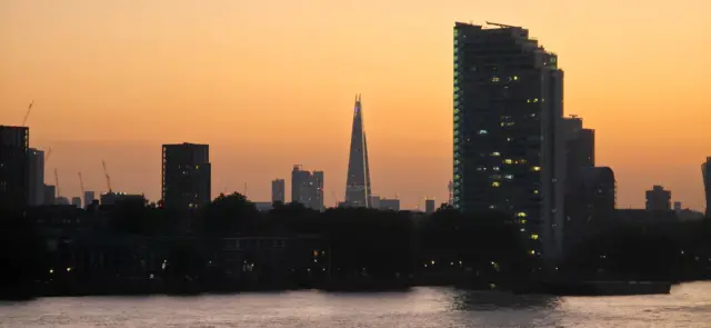 The London city skyline at dawn