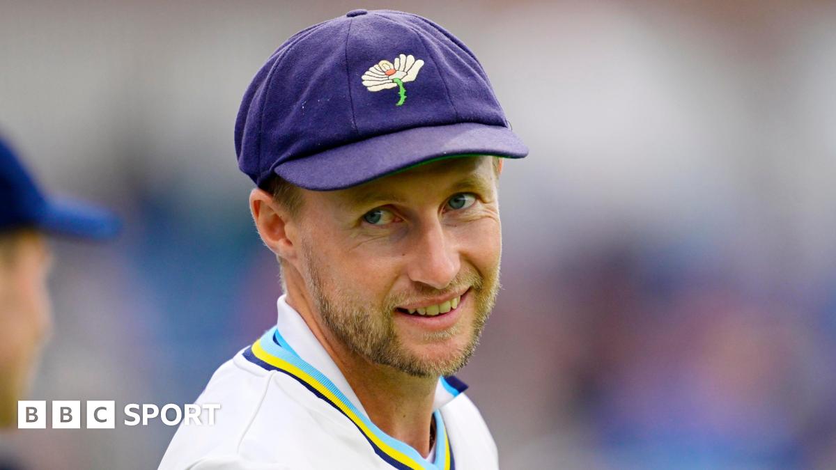 Joe Root smiles