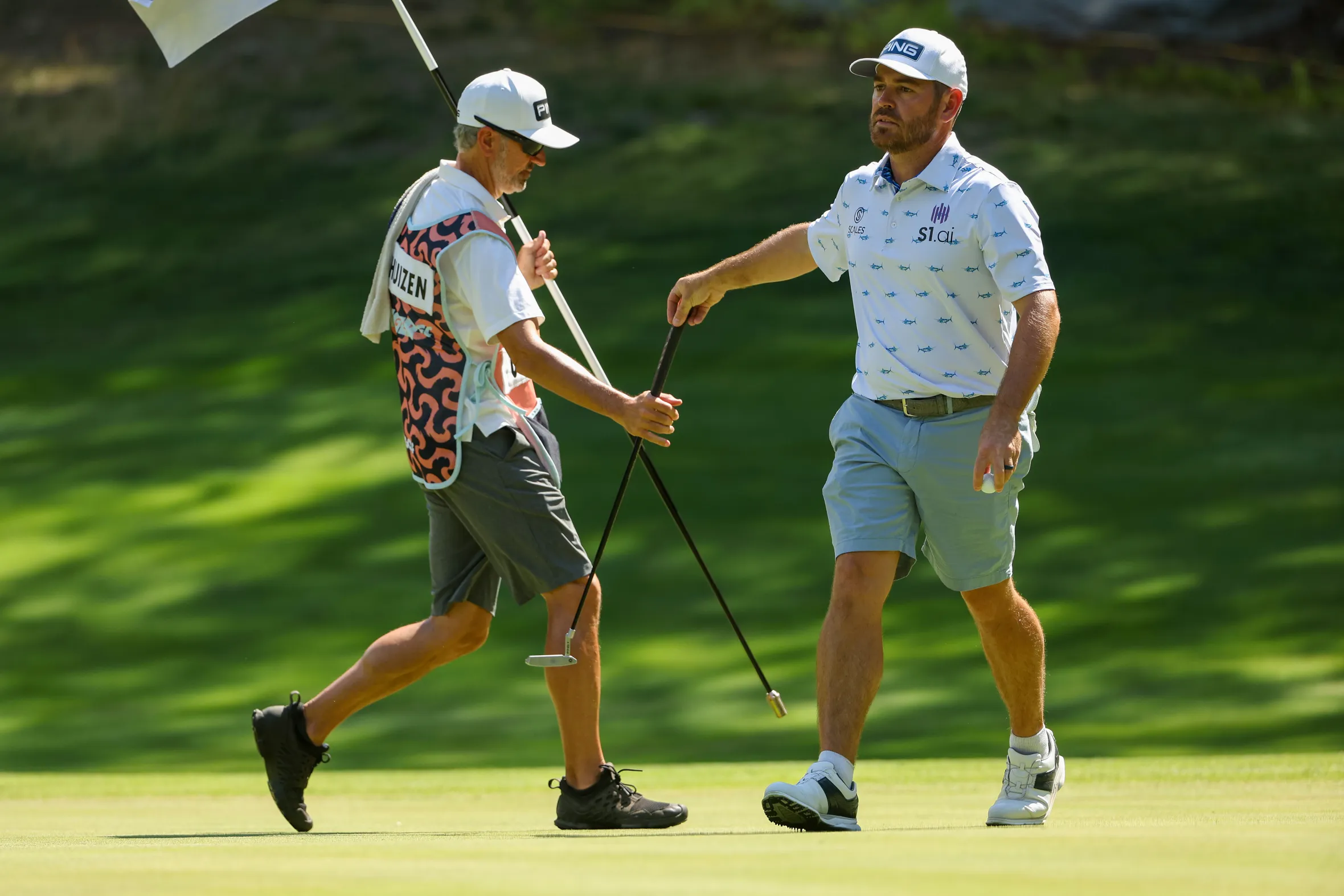 Louis Oosthuizen of Stinger GC reacts after putting at the LIV Golf Invitational - Boston.