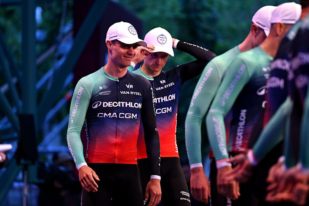 Tobias Lund Andresen walks with his teammates at the team presentation