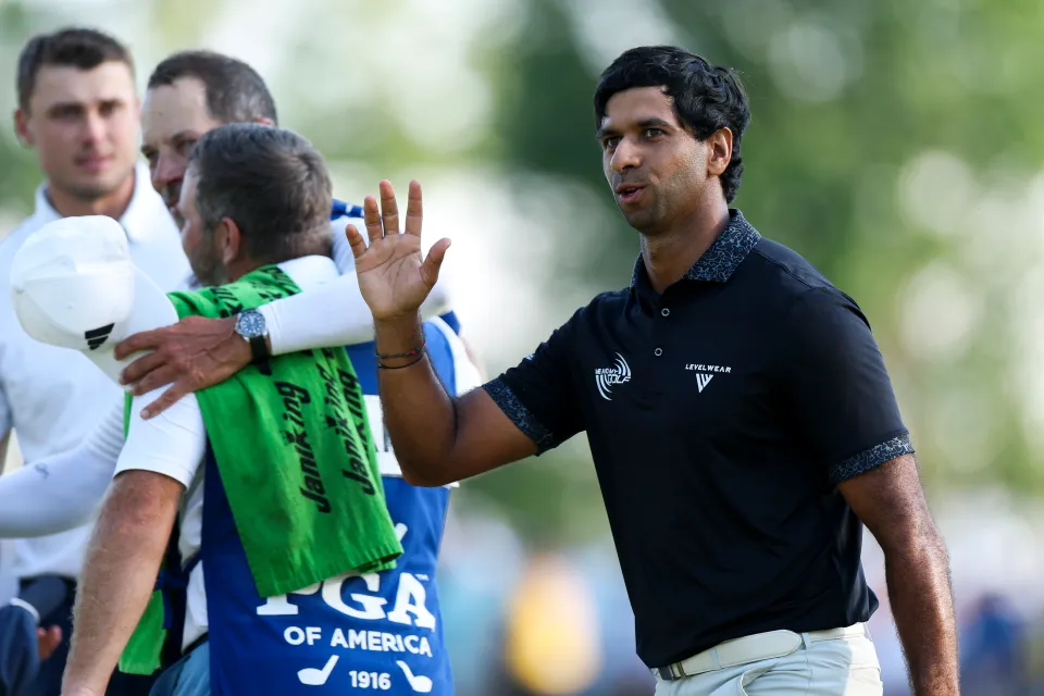 Aaron Rai of England acknowledges the crowd on the 18th green during the final round of the PGA Championship at Aronimink Golf Club on May 17, 2026