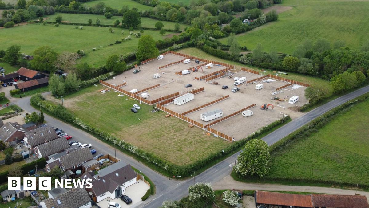 A drone image of an alleged unauthorised traveller development on the northern edge of Willows Green. A hole has been cut in a fence to allow access to an area which has been covered in hardcore. Several fences have been erected, dividing the field into plots.