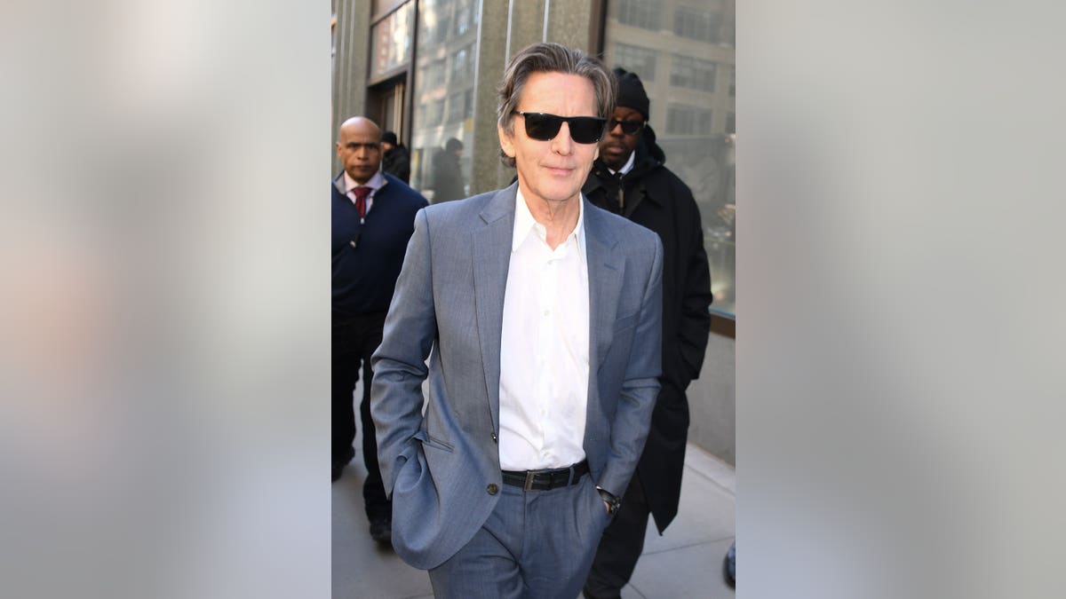 Andrew McCarthy standing outdoors in New York City.