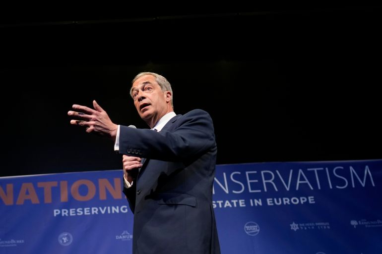 Former MEP and Honorary President of the Reform UK party Nigel Farage speaks during the National Conservatism conference in Brussels, Tuesday, April 16, 2024. (AP Photo/Virginia Mayo)