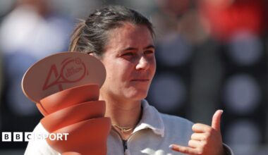Emma Navarro celebrates winning Strasbourg Open as she holds the orange trophy