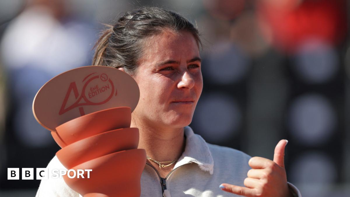 Emma Navarro celebrates winning Strasbourg Open as she holds the orange trophy