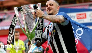 Oliver Norburn celebrates promotion to League One with Notts County