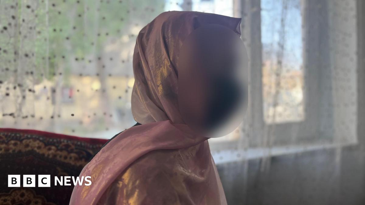 Afghan boys in white hats sit on a rug on the floor and study the Quran at a madrasa, an Islamic school in Argo district, Badakhshan province on May 12, 2026.