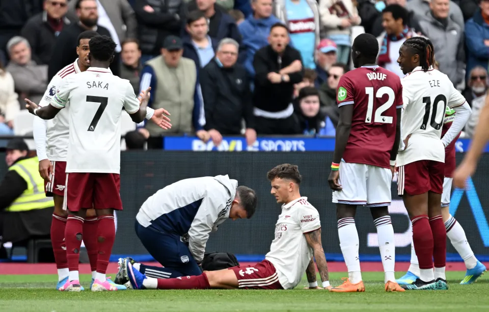 Ben White receives treatment during West Ham United vs Arsenal