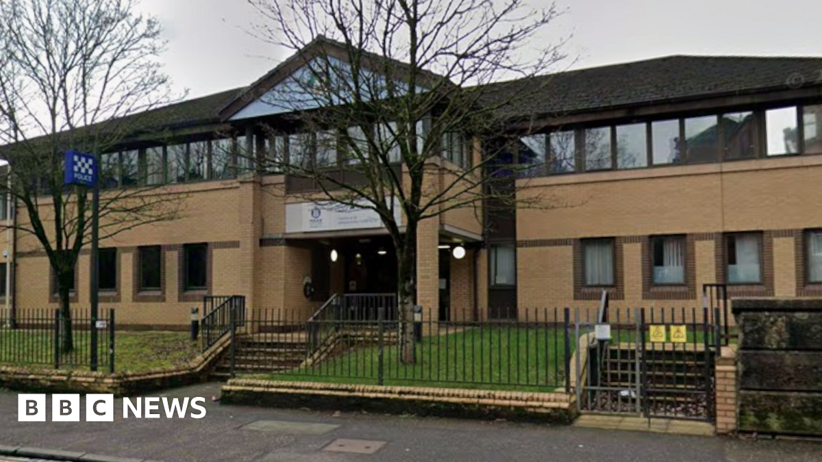 a google view of the exterior view of a sandstone police station building.