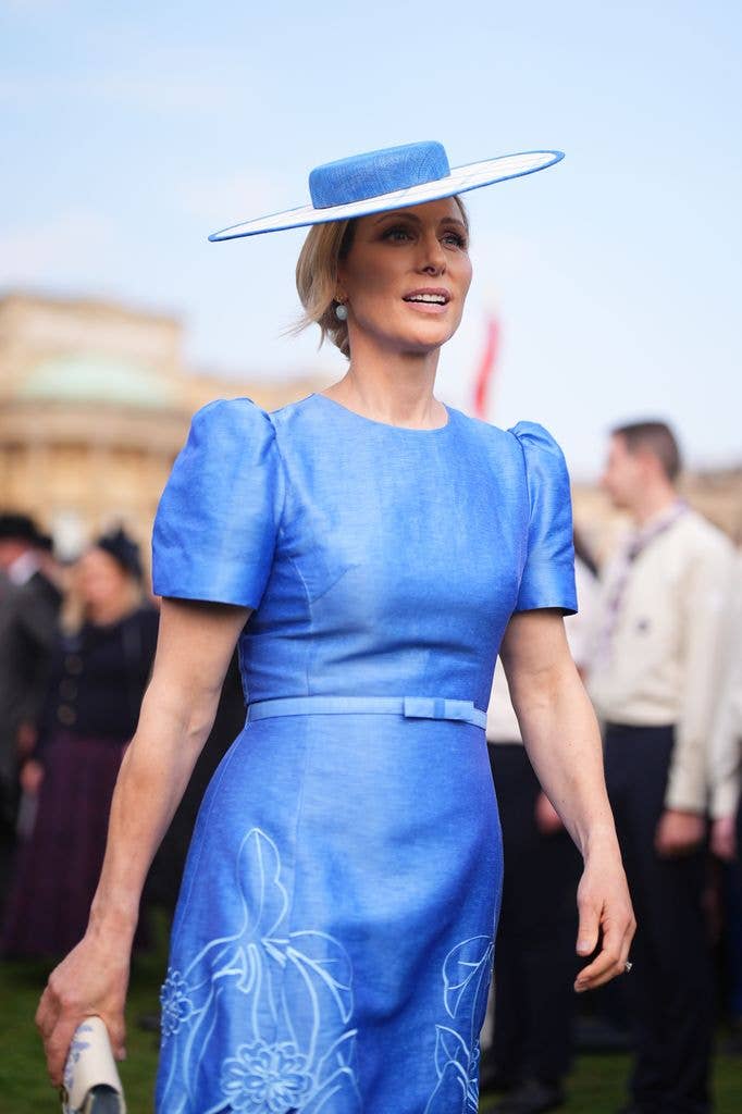 Zara in azure dress and hat