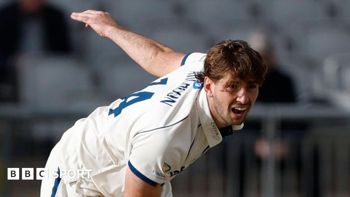 Derbyshire's Ben Aitchison bowls during the County Championship Division Two match against Lancashire at the Emirates, Old Trafford, Manchester in April 2026