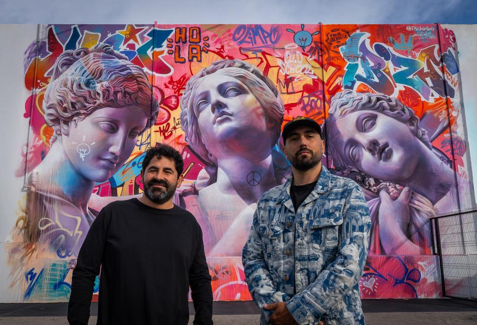Valencian street artists PichiAvo with mural The Three Graces on a wall at Hï Ibiza