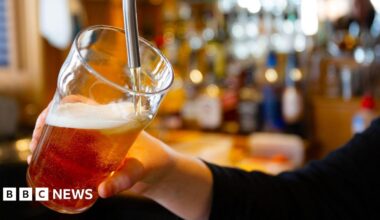 A beer is poured in a bar