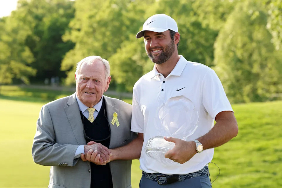 Jack Nicklaus and Scottie Scheffler of the United States pose for photos with the trophy after Scheffler won the Memorial Tournament presented by Workday 2025 at Muirfield Village Golf Club on June 01, 2025 in Dublin, Ohio.